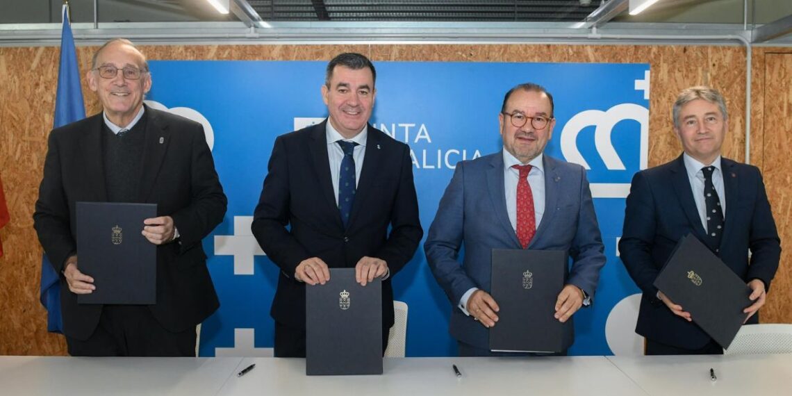 El conselleiro de Educación, Ciencia, Universidades e FP, Román Rodríguez, y los rectores de las tres universiades públicas gallegas.
- XUNTA -
