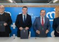 El conselleiro de Educación, Ciencia, Universidades e FP, Román Rodríguez, y los rectores de las tres universiades públicas gallegas.
- XUNTA -